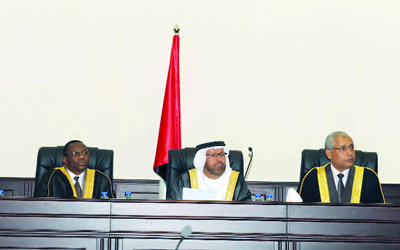 القاضي فلاح الهاجري متوسطاً هيئة المحكمة في إحدى الجلسات.	أرشيفية