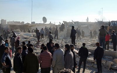 القصف الجوي على مدينة حلب وريفها استخدمت في بعضه البراميل المتفجرة.   أ.ف.ب