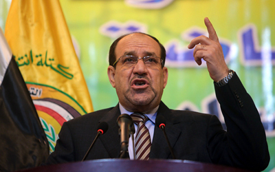 المالكي خلال مؤتمر ضم سياسيين وعسكريين أمس. أ.ف.ب