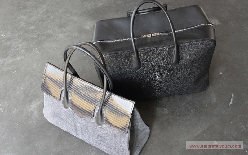 حقائب من جلد خشن وجلد تمساح وفحم.