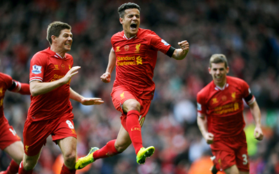 لاعبو ليفربول يحتفلون بعد الإطاحة بسيتي في المباراة الأخيرة. أ.ف.ب