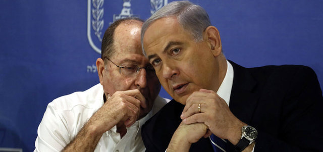 نتنياهو ويعلون بعد تهديداته لغزة.    أ.ف.ب