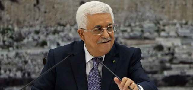 عباس خلال إعلانه التوصل إلى اتفاق لوقف إطلاق النار مع إسرائيل. أ.ف.ب
