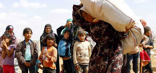 التحالف قصف للمرة الثانية مواقع لـ«داعش» في بلدة عين العرب التي فرّ منها نحو 160 ألف شخص إلى تركيا بسبب تقدم التنظيم فيها. إي.بي.إيه