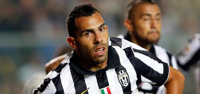 تيفيز يأمل أن يهز شباك أتلتيكو اليوم في معقله بمدريد وبين جماهيره. رويترز