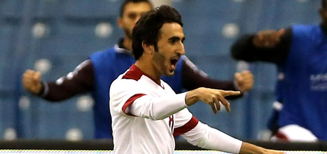 لاعب قطر علي أسد. أ.ف.ب