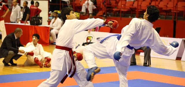 جانب من منافسات نسخة العام الماضي لـ«دولية الأهلي المفتوحة للكاراتيه». تصوير: أسامة أبوغانم