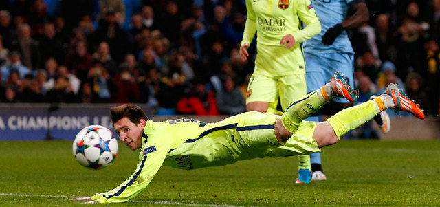 ميسي يأمل تأمين الفوز على غرناطة اليوم وانتظار تعثر الريال أمام فياريال. رويترز