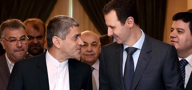 الأسد لدى استقباله وزير الاقتصاد والمالية الإيراني.  أ.ب