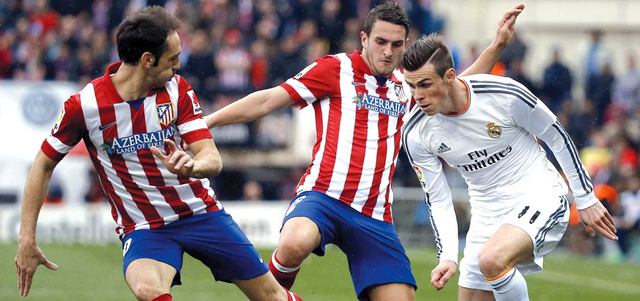 شهرة ريال مدريد وبرشلونة وبايرن ميونيخ وأتلتيكو رفعت من أسهم دوري الأبطال مالياً. أ.ف.ب