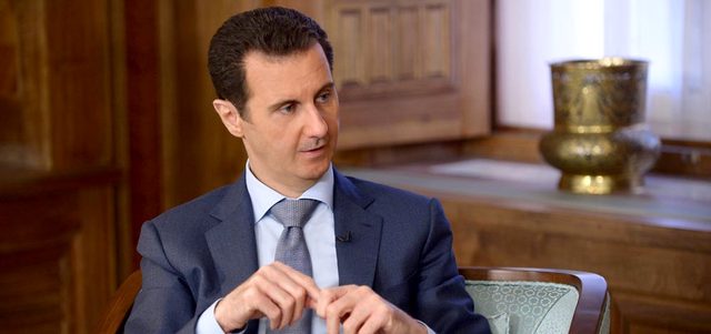 الأسد: الأزمة السورية زادت تعقيداً جراء التدخل الخارجي، والأمر بات أكثر خطورة الآن، بسبب غياب القانون الدولي.  إي.بي.إيه