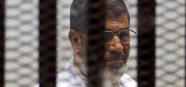 مرسي ينتظر أيضا المحاكمة في أربع قضايا أخرى.   رويترز