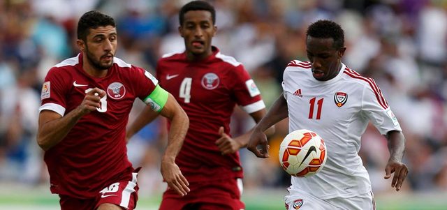 منتخب قطر تلقى هزيمة قاسية بالأربعة من الأبيض في نهائيات آسيا. رويترز