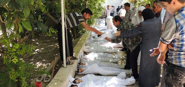 1429 شخصاً قتلوا بـ «هجوم كيماوي» لقوات النظام في الغوطة الشرقية لدمشق. أ.ف.ب