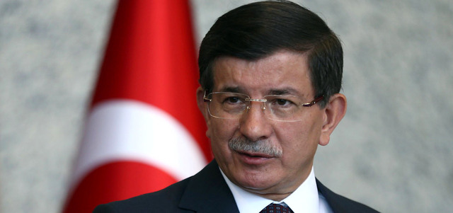 داود أوغلو: إن أدنى تحرك يشكل خطراً على تركيا سيؤدي إلى أقسى ردود الفعل.  أ.ف.ب