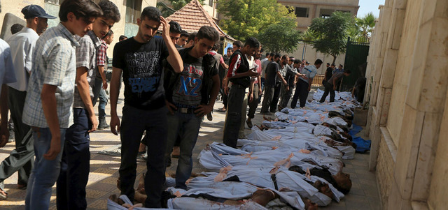 عدد ضحايا المجزرة التي نفذتها طائرات النظام في مدينة دوما وصل إلى 96 قتيلاً بينهم 4 أطفال و250 مصاباً.  رويترز