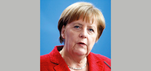 المستشارة الألمانية ميركل من أقوى نساء العالم تفضّل قَصة البوب ذي الشعر القصير.