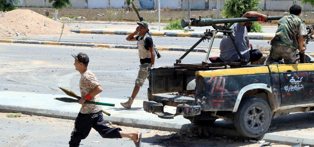قوات حكومة الوفاق خلال معركة مع تنظيم داعش. أ.ف.ب