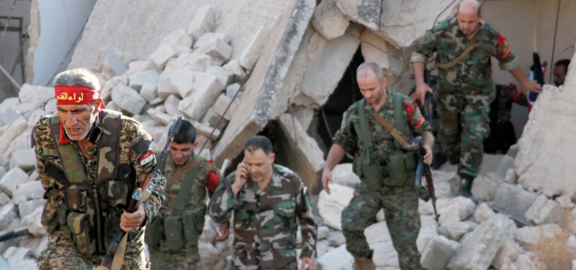 قوات النظام السوري في منطقة العويجة بحلب. رويترز