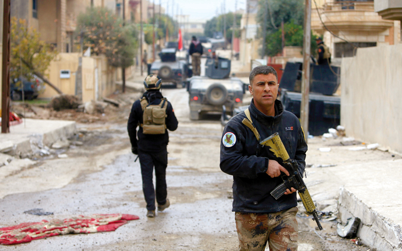 عناصر من قوات العمليات الخاصة العراقية في الموصل. رويترز