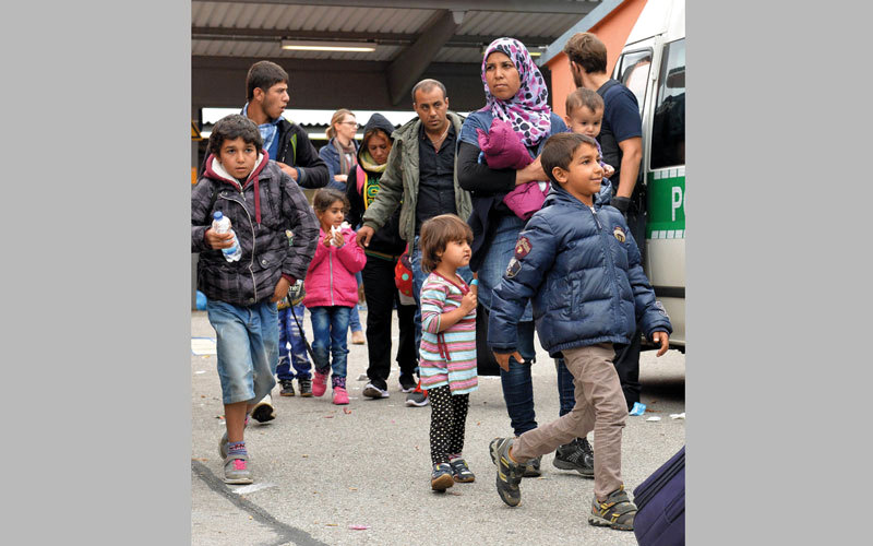 أعداد متزايدة من اللاجئين السوريين تغادر ألمانيا طوعاً. أ.ب