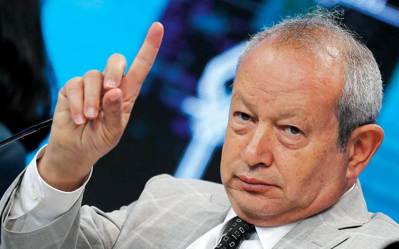 ساويرس متهم بممارسة نفوذه المالي على الحزب.  رويترز