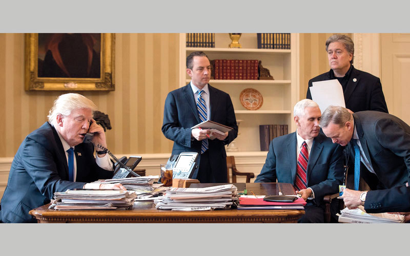 ترامب متحدثا في الهاتف مع بوتين، غيتي