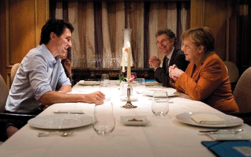 عشاء على ضوء الشموع مع ميركل. غيتي