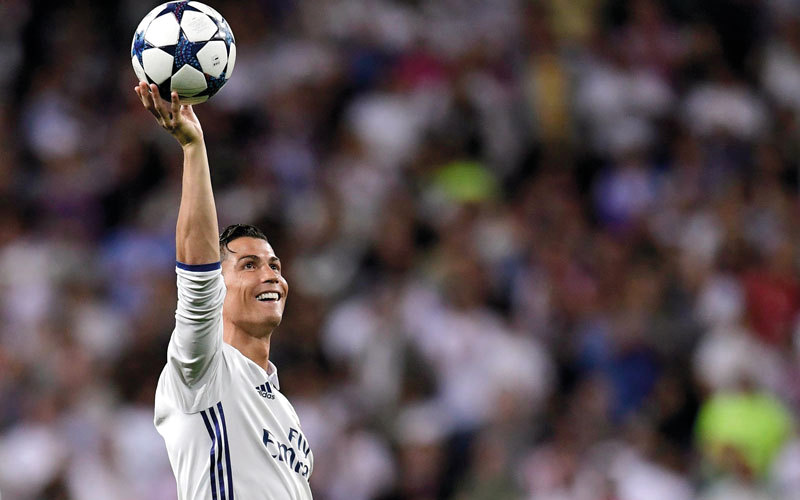 رونالدو يحتفل بليلة تاريخية، والهدف الـ100 في أبطال أوروبا. أ.ف.ب