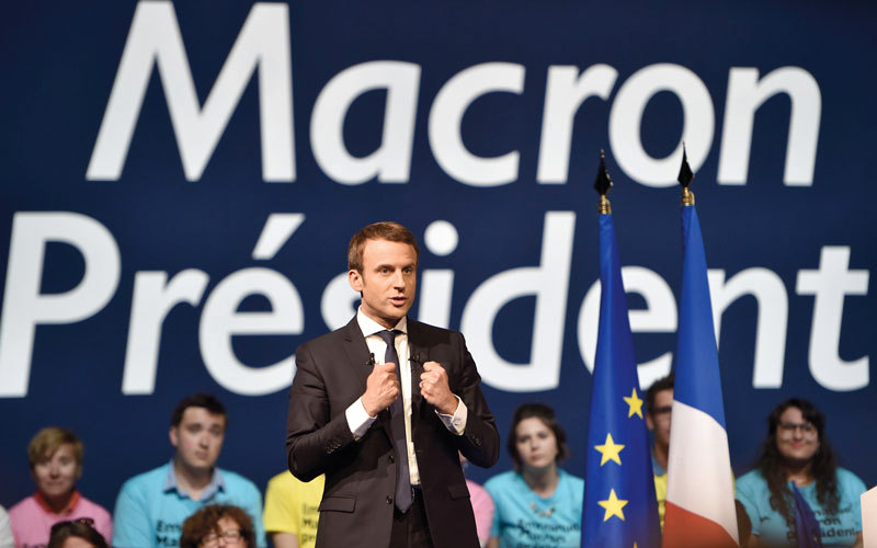 ماكرون حظي بدعم 25% من الناخبين.  أ.ف.ب
