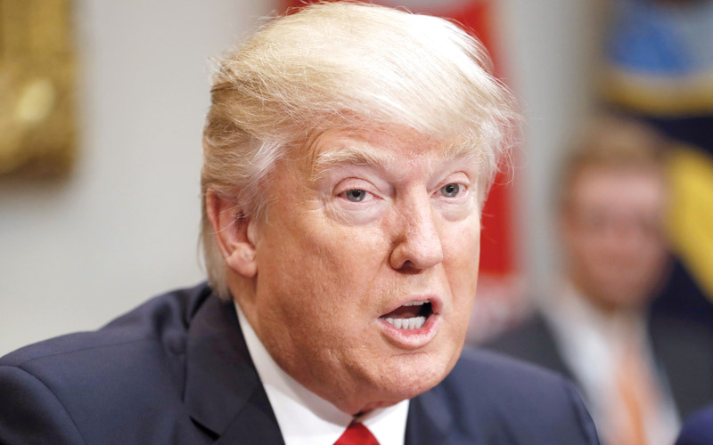 ترامب اتهم أوباما بالتجسس عليه. أ.ب