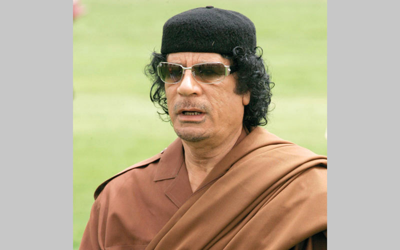 القذافي «عدو بريطانيا» وصديق بلير. غيتي